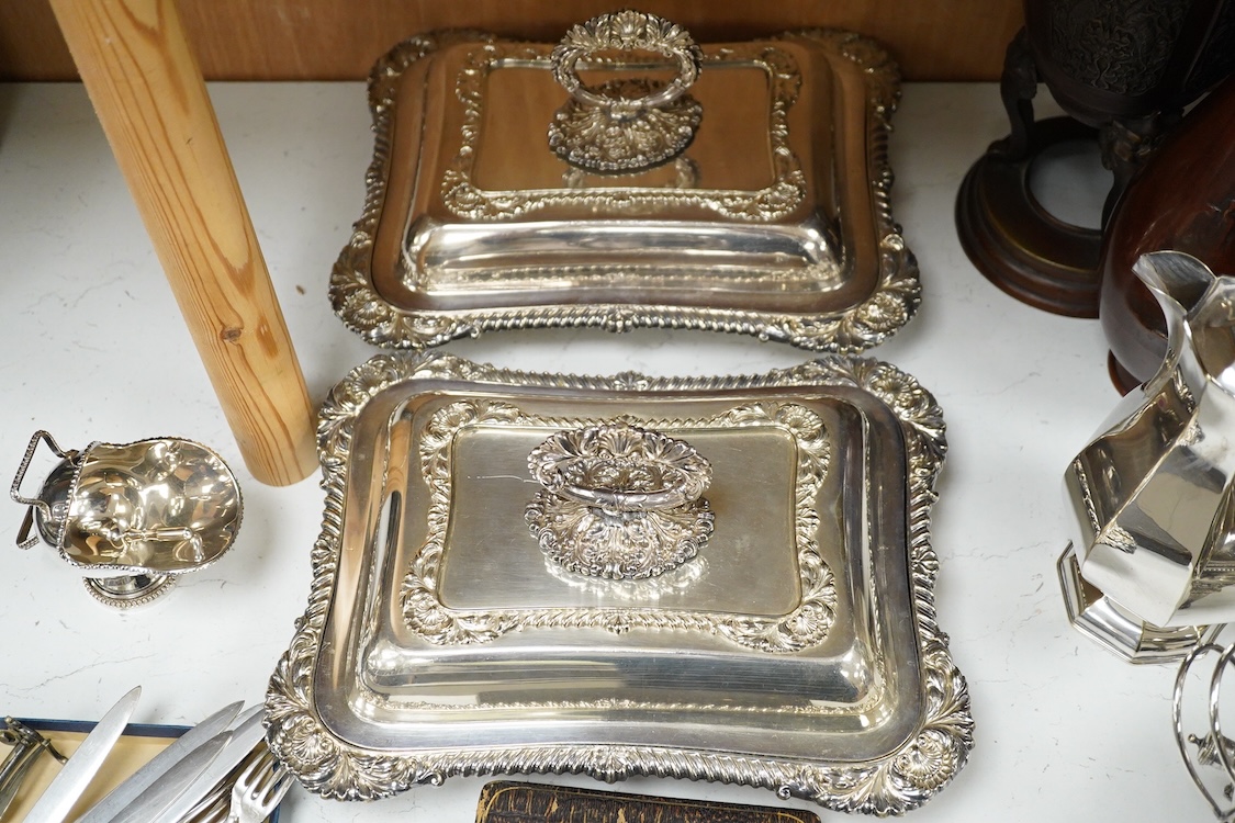 A quantity of plated wares to include two dishes and a cased set of six coffee bean spoons